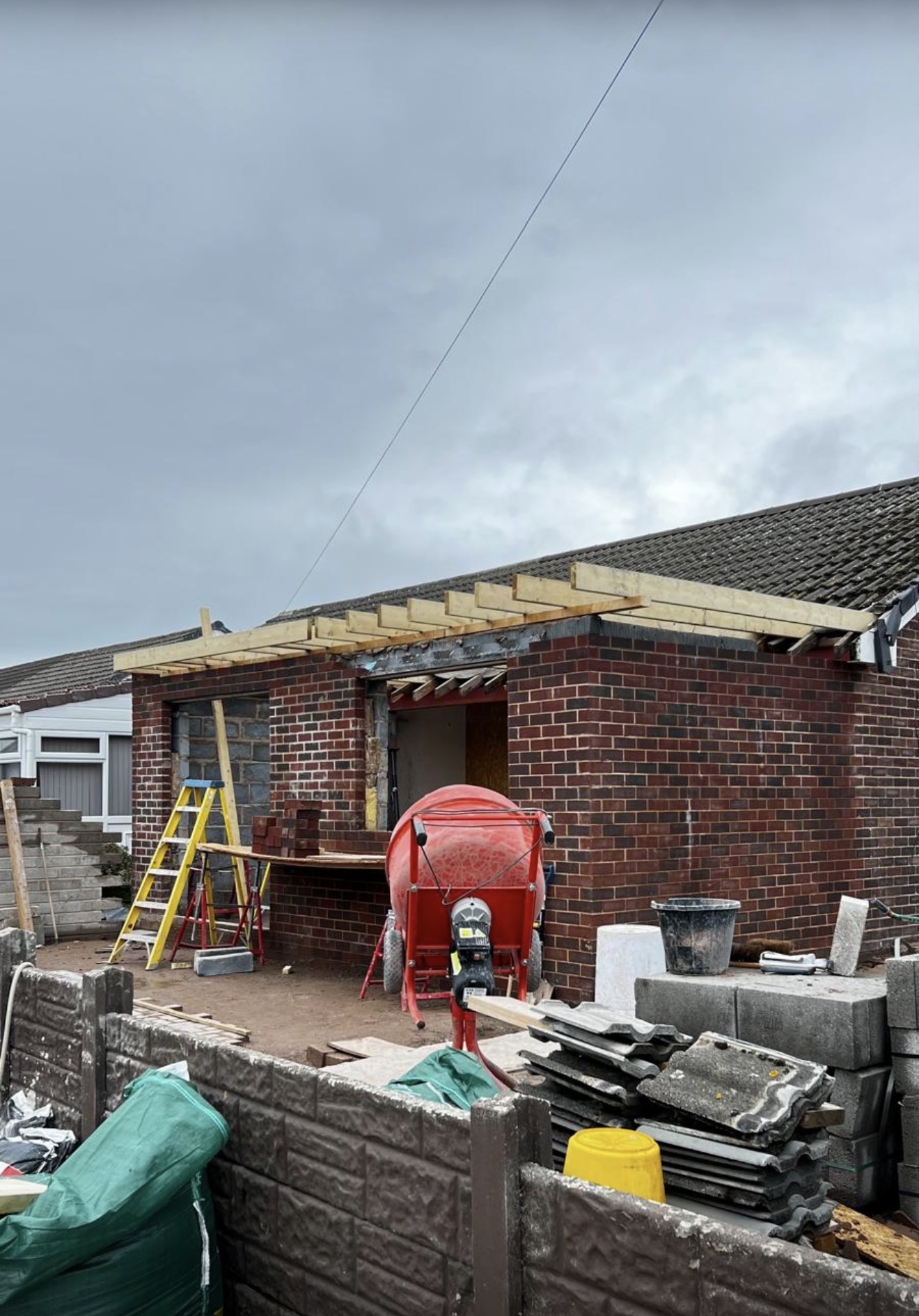 Brick extension taking shape with new roof timbers