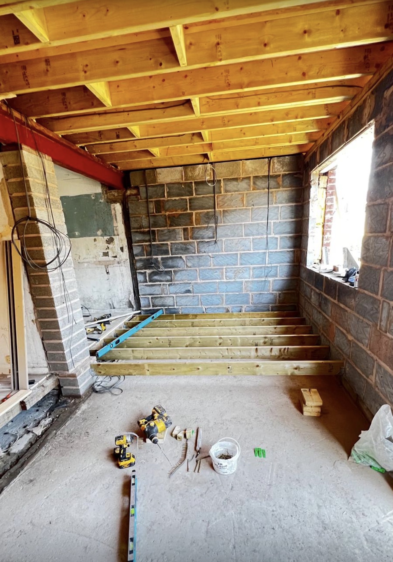 Internal extension structure with timber joists and blockwork